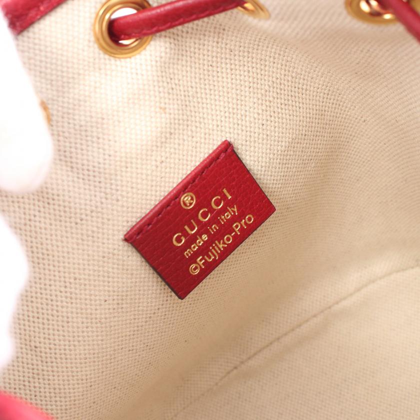 Gucci ÃƒÆ’Ã¢â‚¬â€ Doraemon Mini Bucket Bag in Multicolor PVC Leather - Micro GG Supreme Light Brown Shoulder Bag