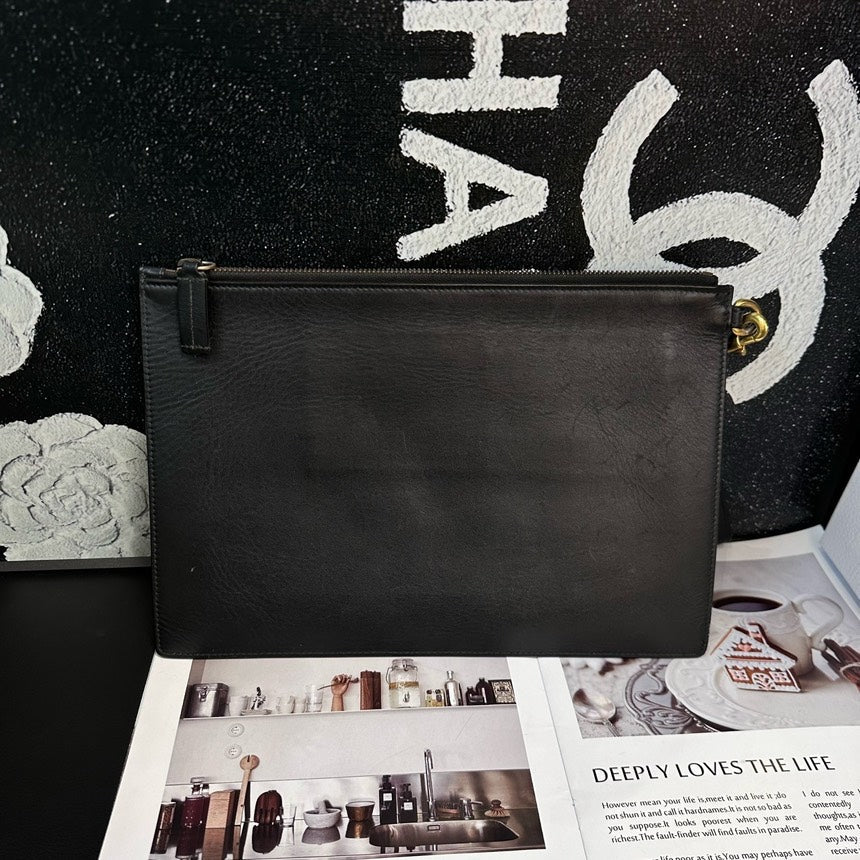 Gucci Black Leather Gold Tiger Logo Clutch Bag