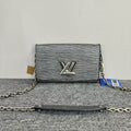 Louis Vuitton Twist WOC SiLouis Vuittoner Clutch