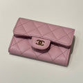 Pre-loved Chanel Classic Pink Quilted Wallet