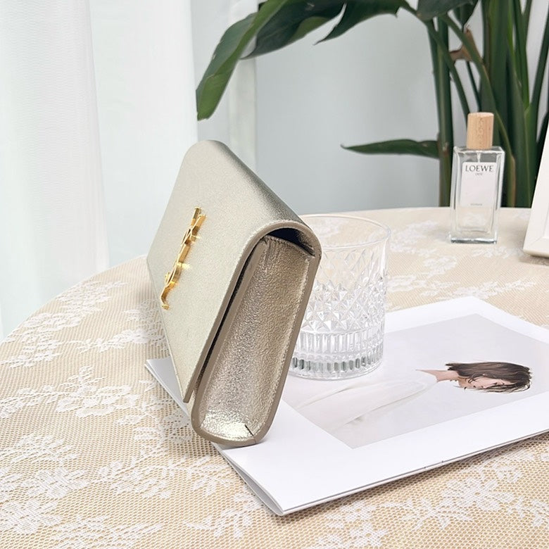 Pre-loved YSL SiLouis Vuittoner Metallic Leather Clutch Bag