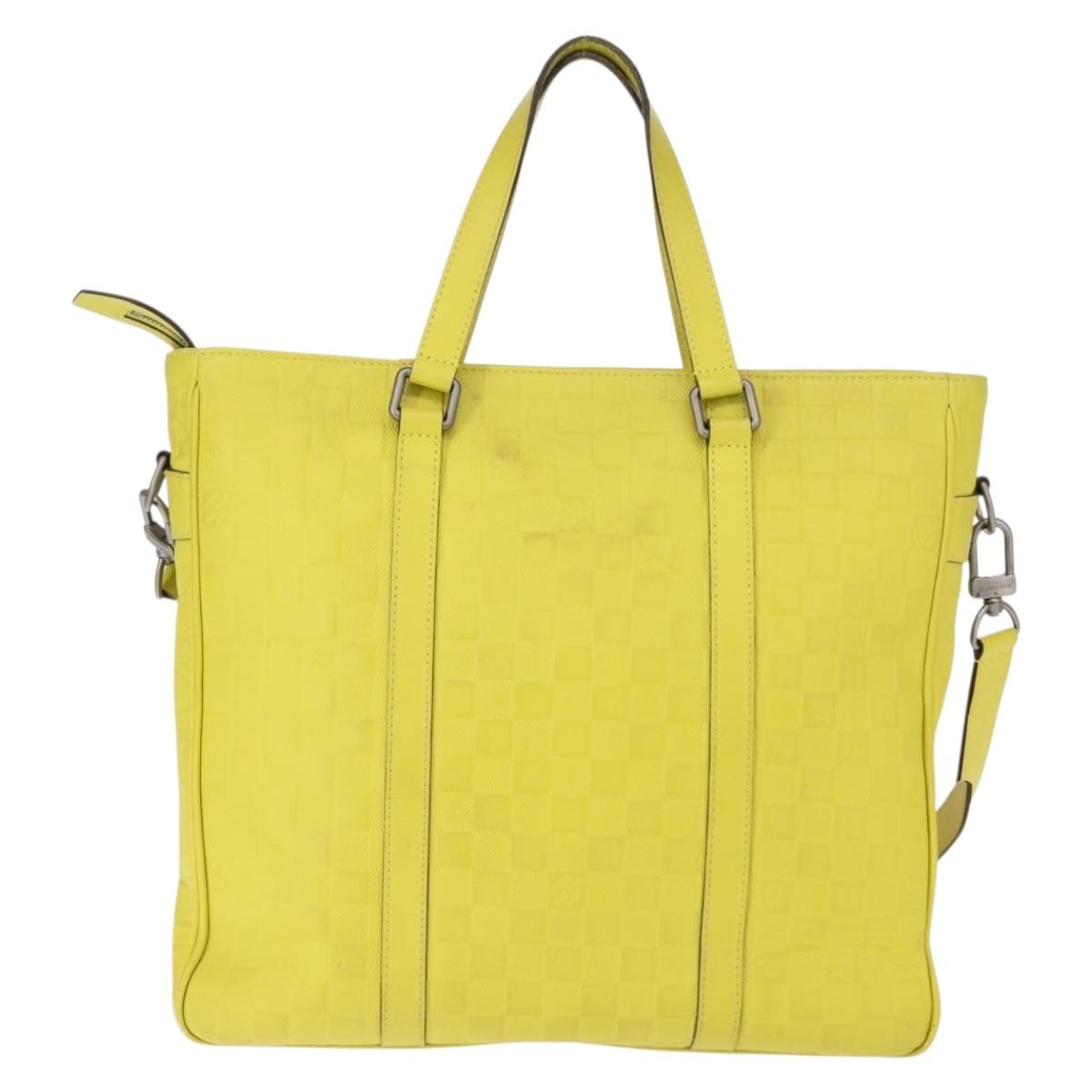 Louis Vuitton Tadao Handbag Damier Infini Leather Yellow Leather Handbag