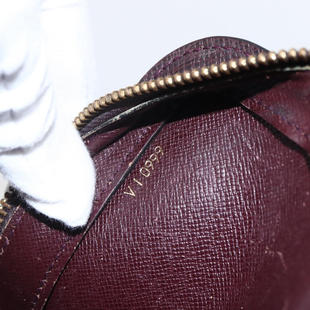 Louis Vuitton Pochette Baikal Clutch Taiga Leather Burgundy Leather Clutche & Pouche Bag