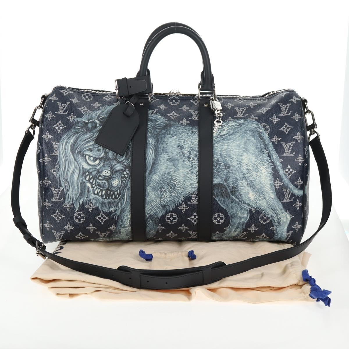 Louis Vuitton Keepall Bandouliere Bag Limited Edition Chapman Savane Monogram Canvas Navy Canvas Travel Bag