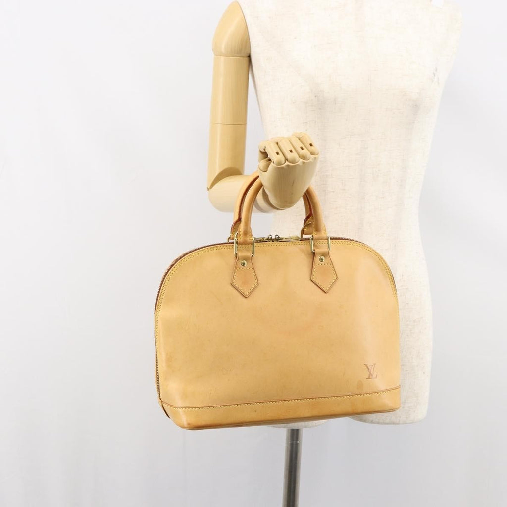 Louis Vuitton Alma Handbag Nomade Leather Beige Leather Handbag
