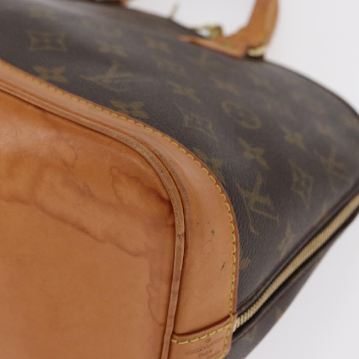 Louis Vuitton Alma Handbag Monogram Canvas Brown Canvas Handbag