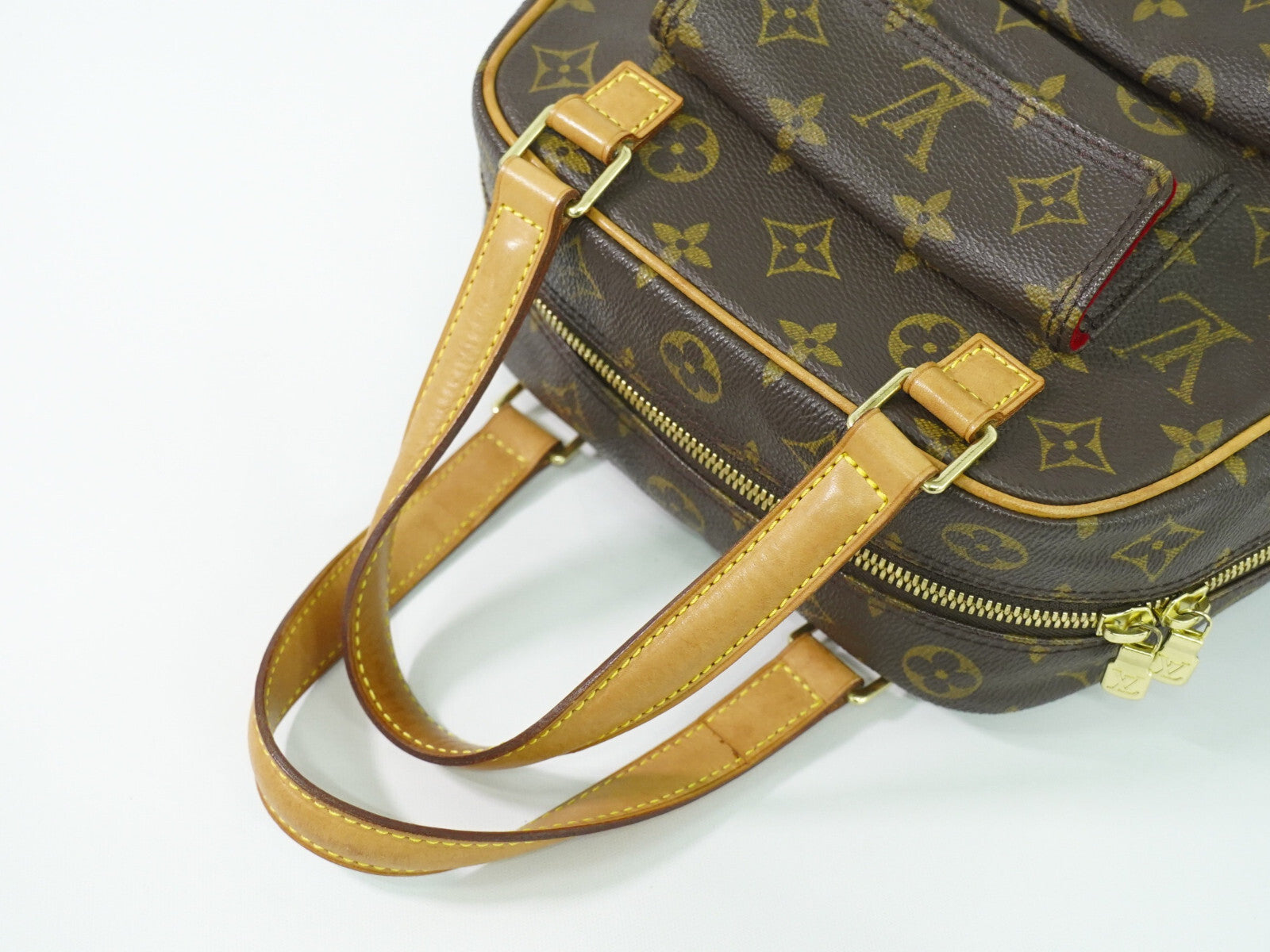 Louis Vuitton Excentri-Cite Handbag Monogram Canvas Brown Canvas Handbag