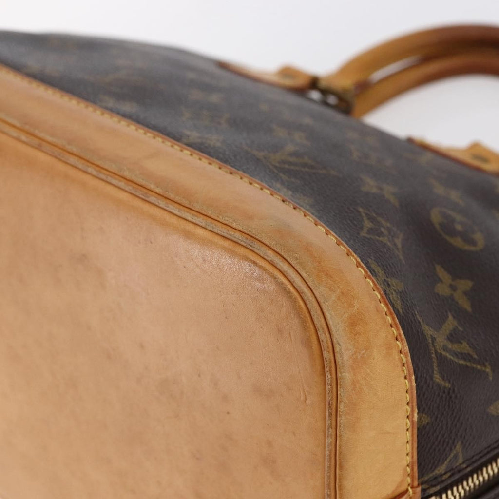 Louis Vuitton Alma Handbag Monogram Canvas Brown Canvas Handbag