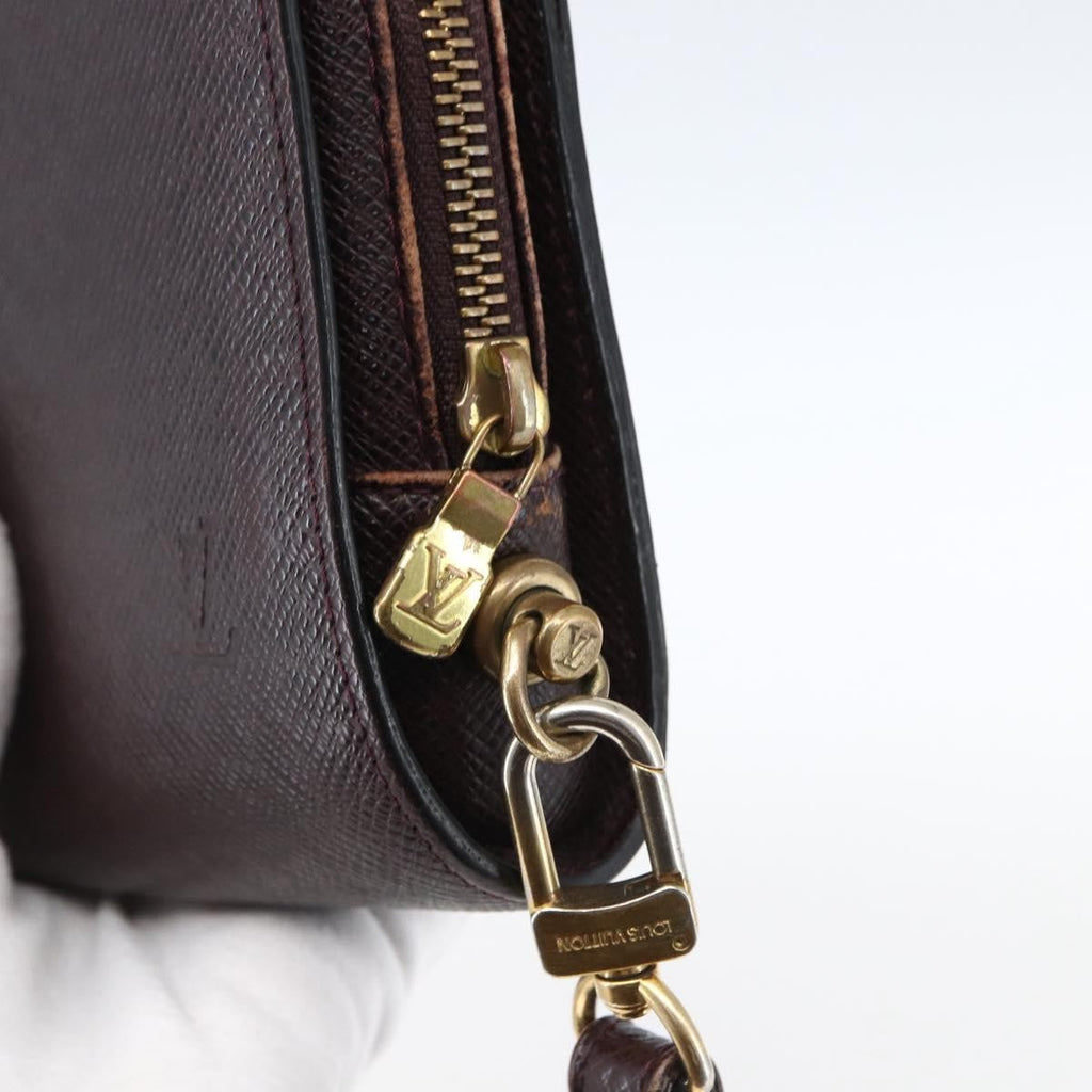 Louis Vuitton Pochette Baikal Clutch Taiga Leather Burgundy Leather Clutche & Pouche Bag