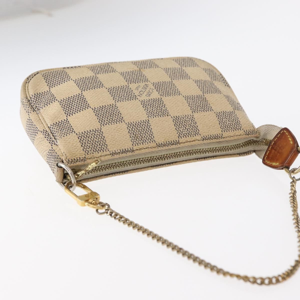 Louis Vuitton Mini Pochette Accessoires Damier Canvas White Canvas Clutche & Pouche Bag