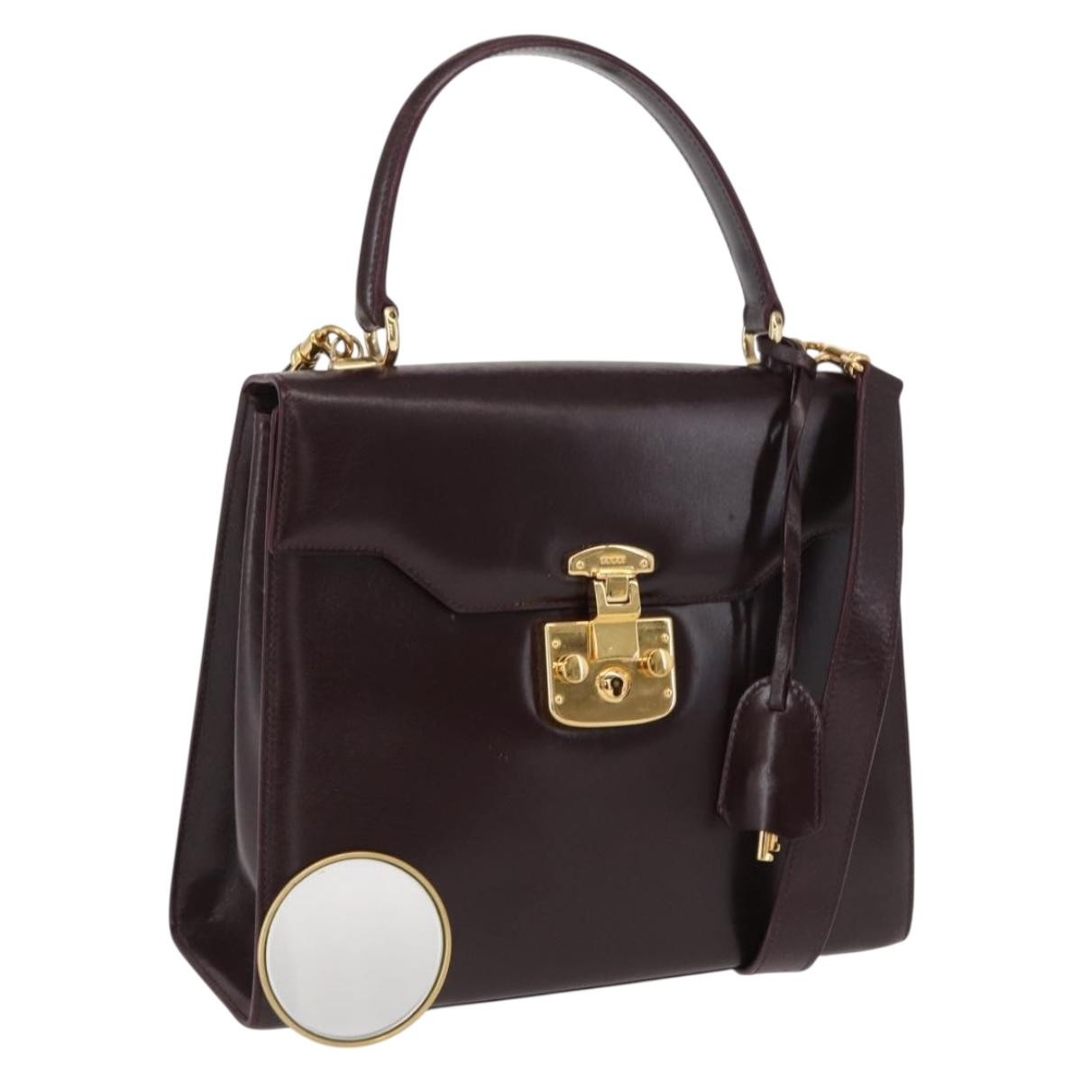 Gucci Vintage Lady Lock Top Handle Bag Leather Burgundy Leather Handbag (Pre-Owned)