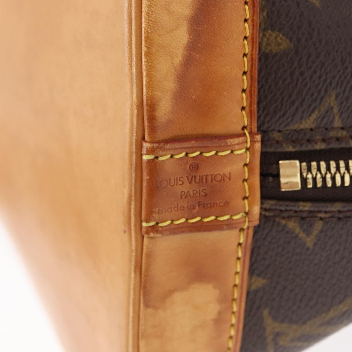 Louis Vuitton Alma Handbag Monogram Canvas Brown Canvas Handbag