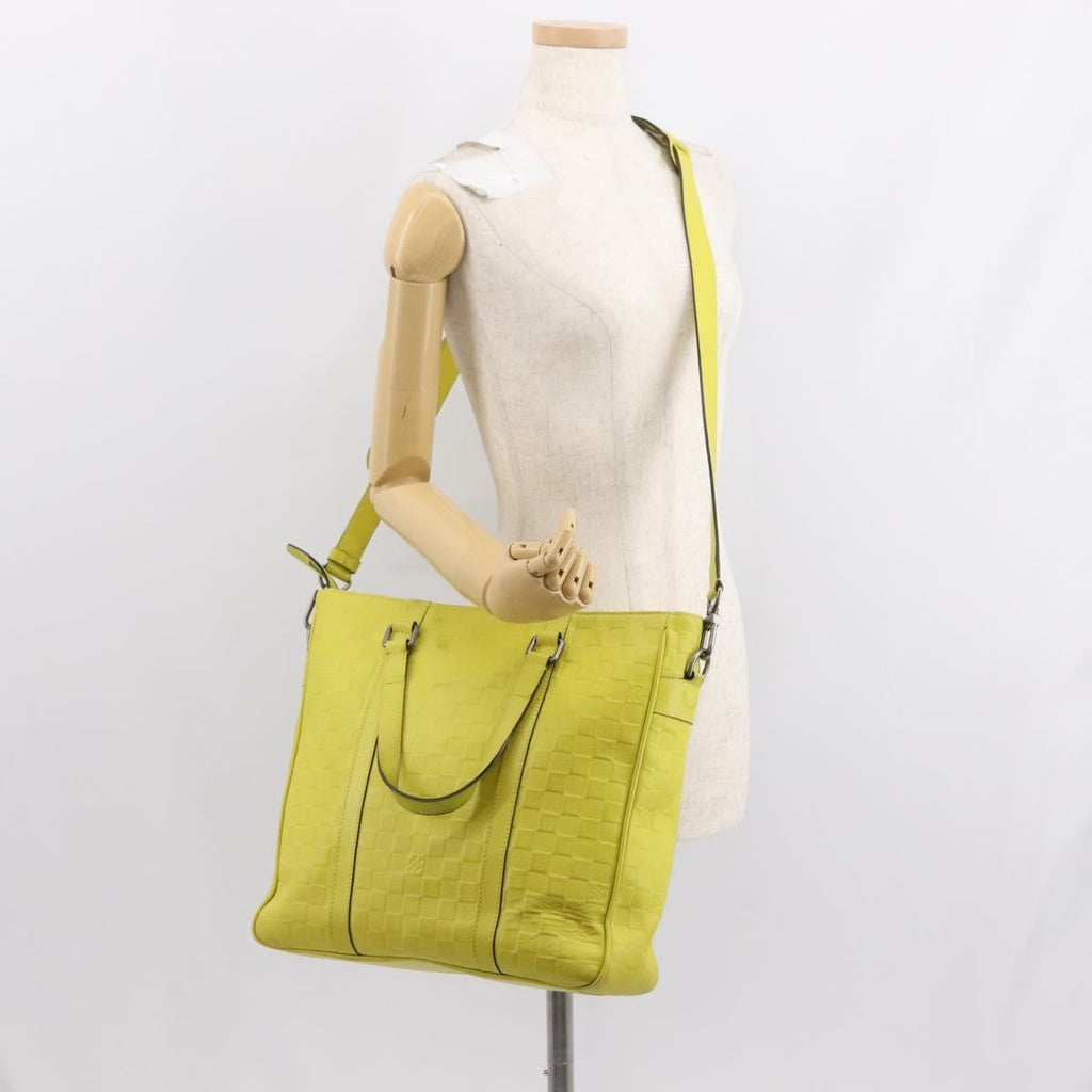 Louis Vuitton Tadao Handbag Damier Infini Leather Yellow Leather Handbag