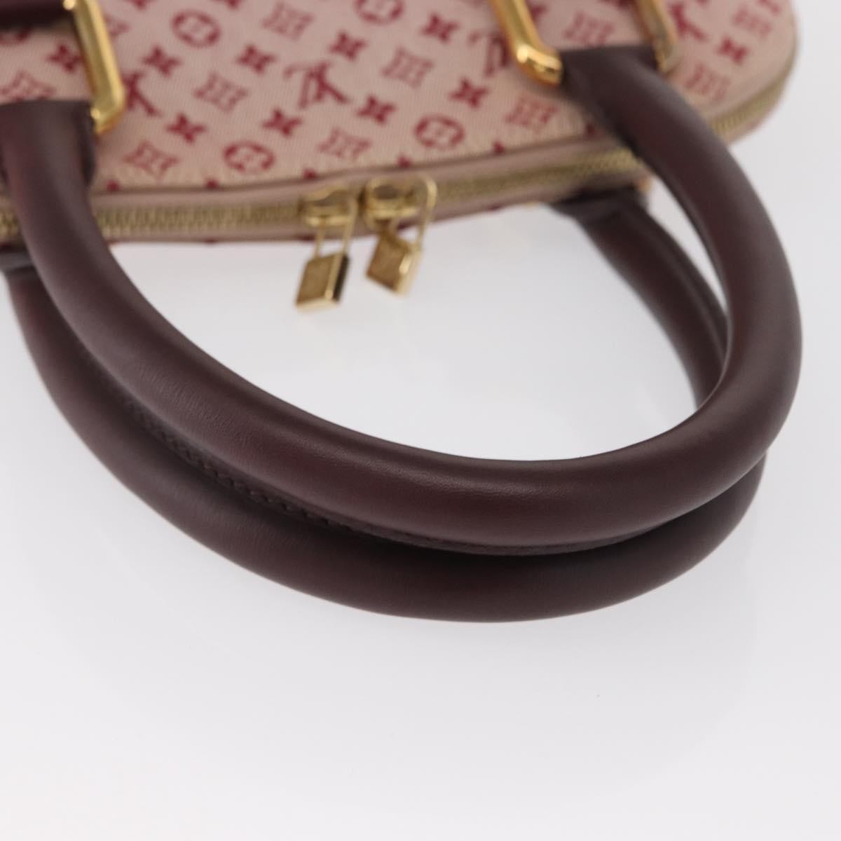Louis Vuitton Alma Handbag Mini Lin Monogram Red Canvas Handbag