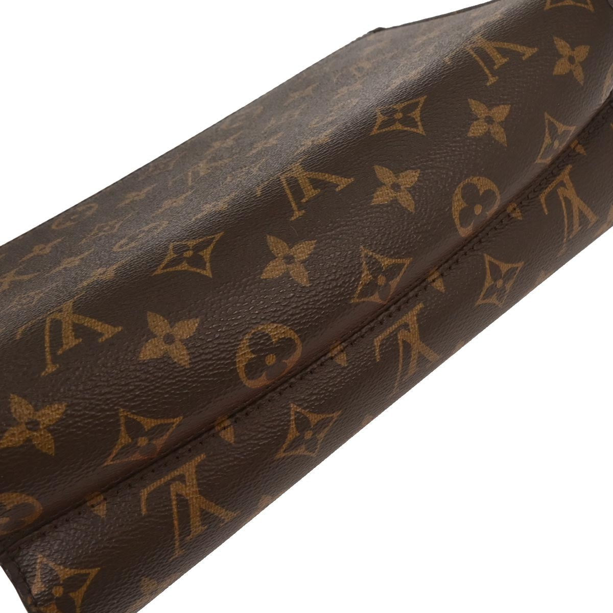 Louis Vuitton Victoire Handbag Monogram Canvas And Leather Brown Canvas Shoulder Bag