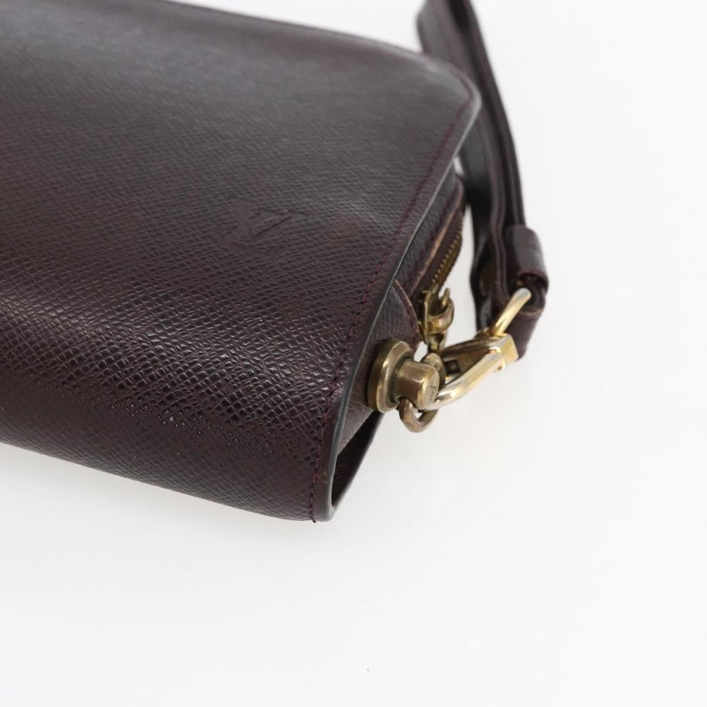 Louis Vuitton Pochette Baikal Clutch Taiga Leather Burgundy Leather Clutche & Pouche Bag