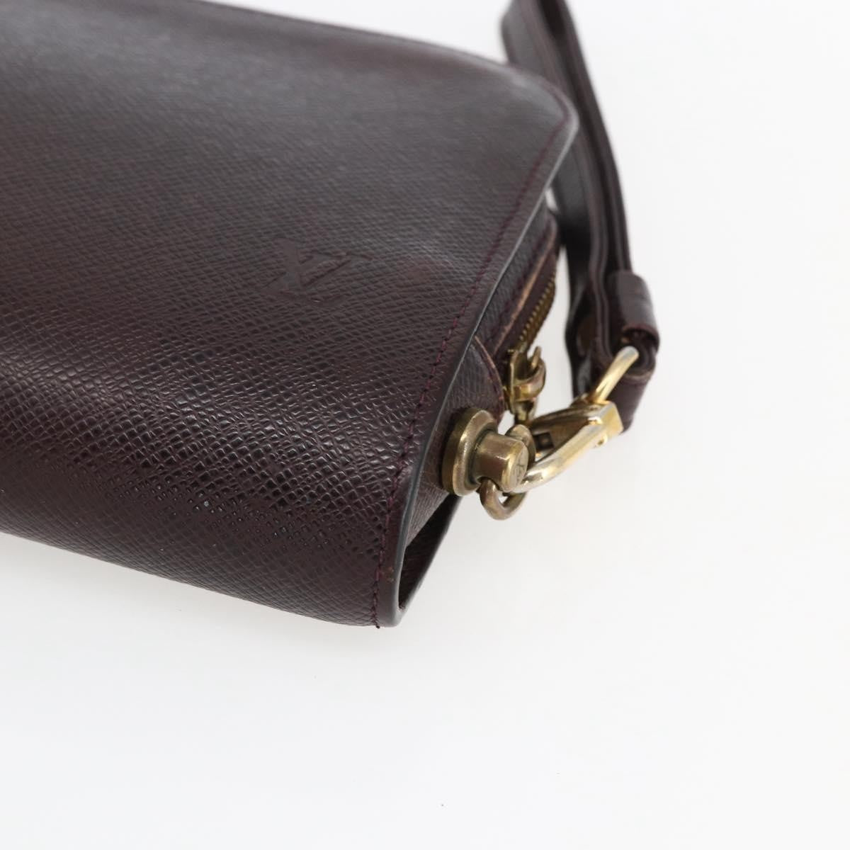 Louis Vuitton Pochette Baikal Clutch Taiga Leather Burgundy Leather Clutche & Pouche Bag