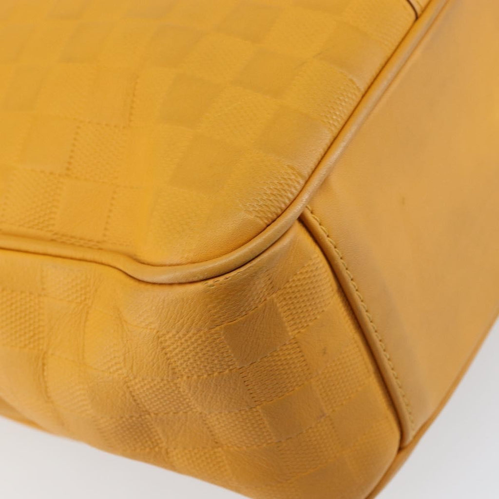 Louis Vuitton Tadao Handbag Damier Infini Leather Yellow Leather Handbag
