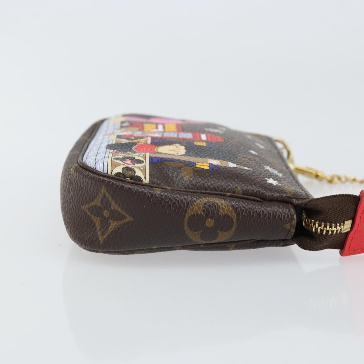 Louis Vuitton Pochette Accessoires Limited Edition Vivienne Xmas Monogram Canvas Brown Canvas Clutche & Pouche Bag