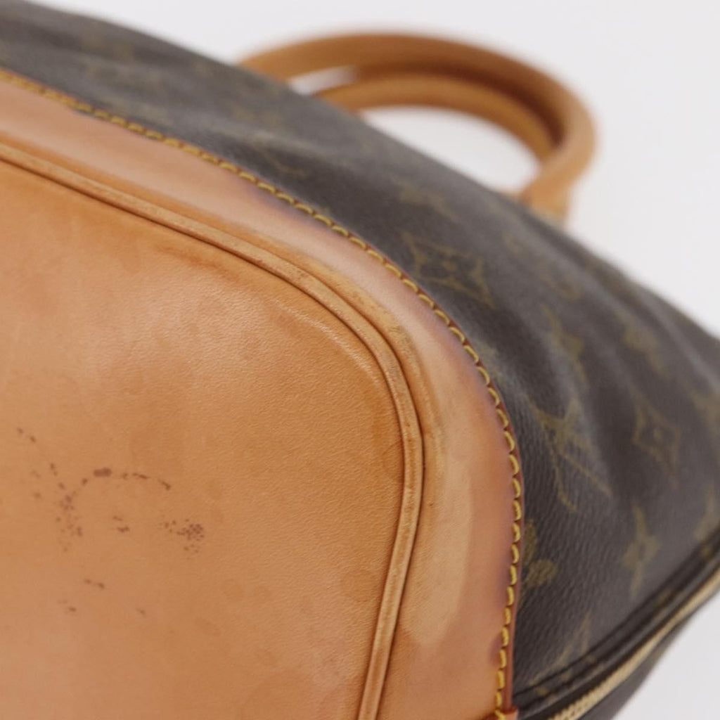 Louis Vuitton Alma Handbag Monogram Canvas Brown Canvas Handbag