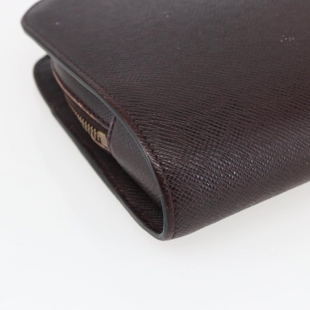Louis Vuitton Pochette Baikal Clutch Taiga Leather Burgundy Leather Clutche & Pouche Bag