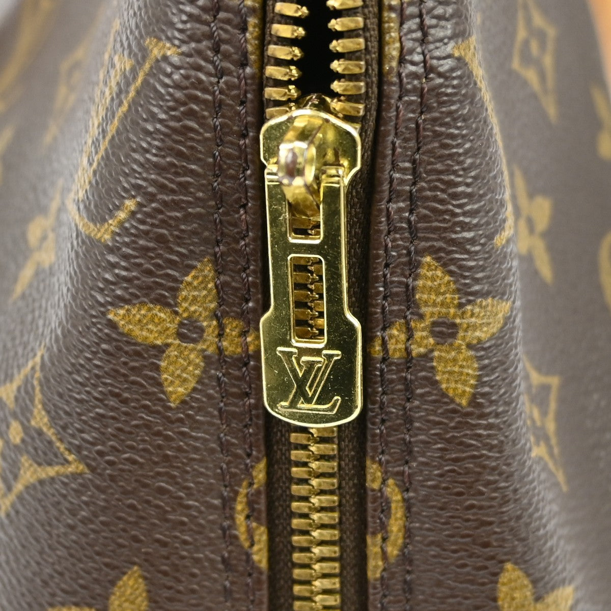 Louis Vuitton Alma Handbag Monogram Canvas Brown Canvas Handbag