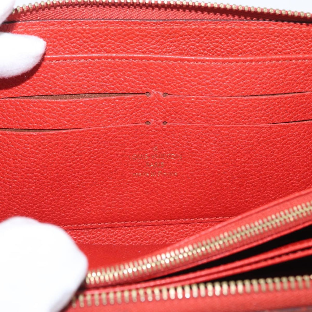 Louis Vuitton Portefeuille Zippy Monogramme Empreinte Monogramme Empreinte Orange Leather Wallets Accessory