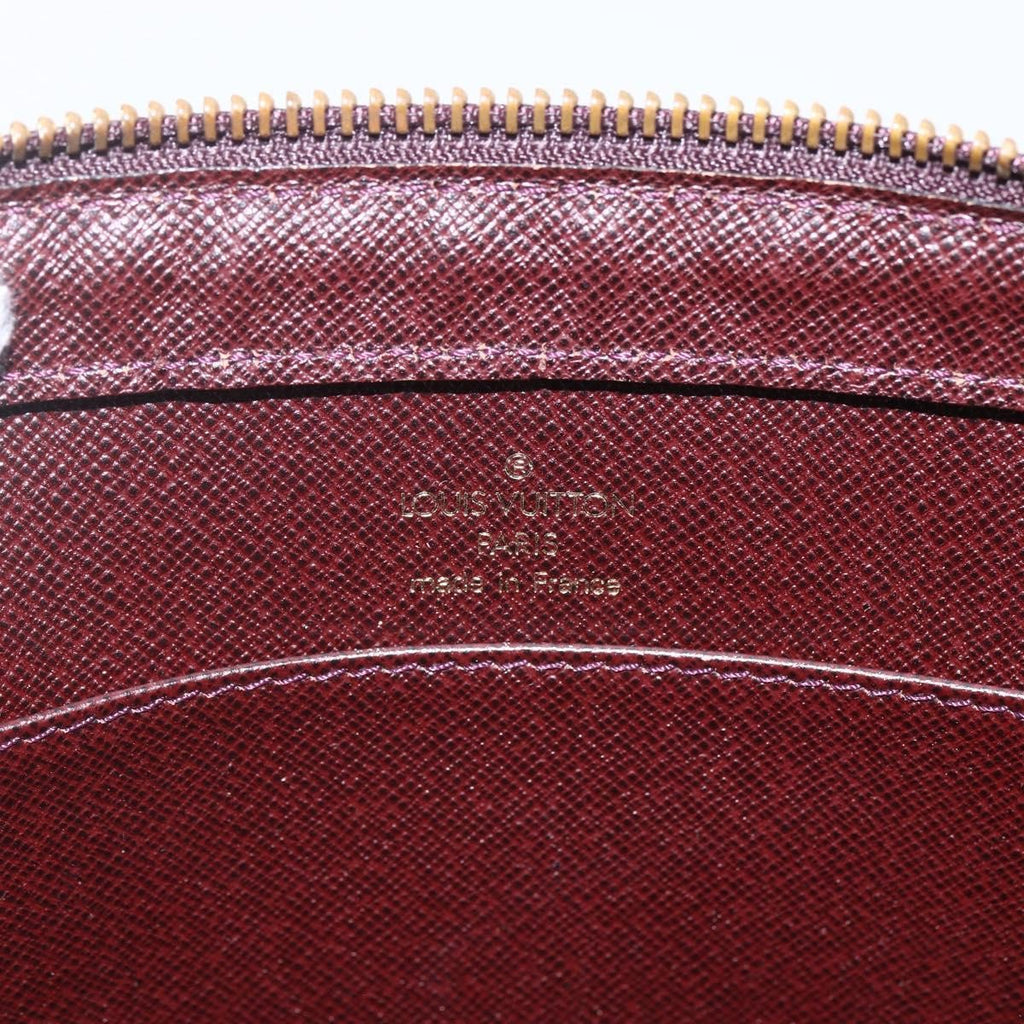 Louis Vuitton Pochette Baikal Clutch Taiga Leather Brown Leather Clutche & Pouche Bag