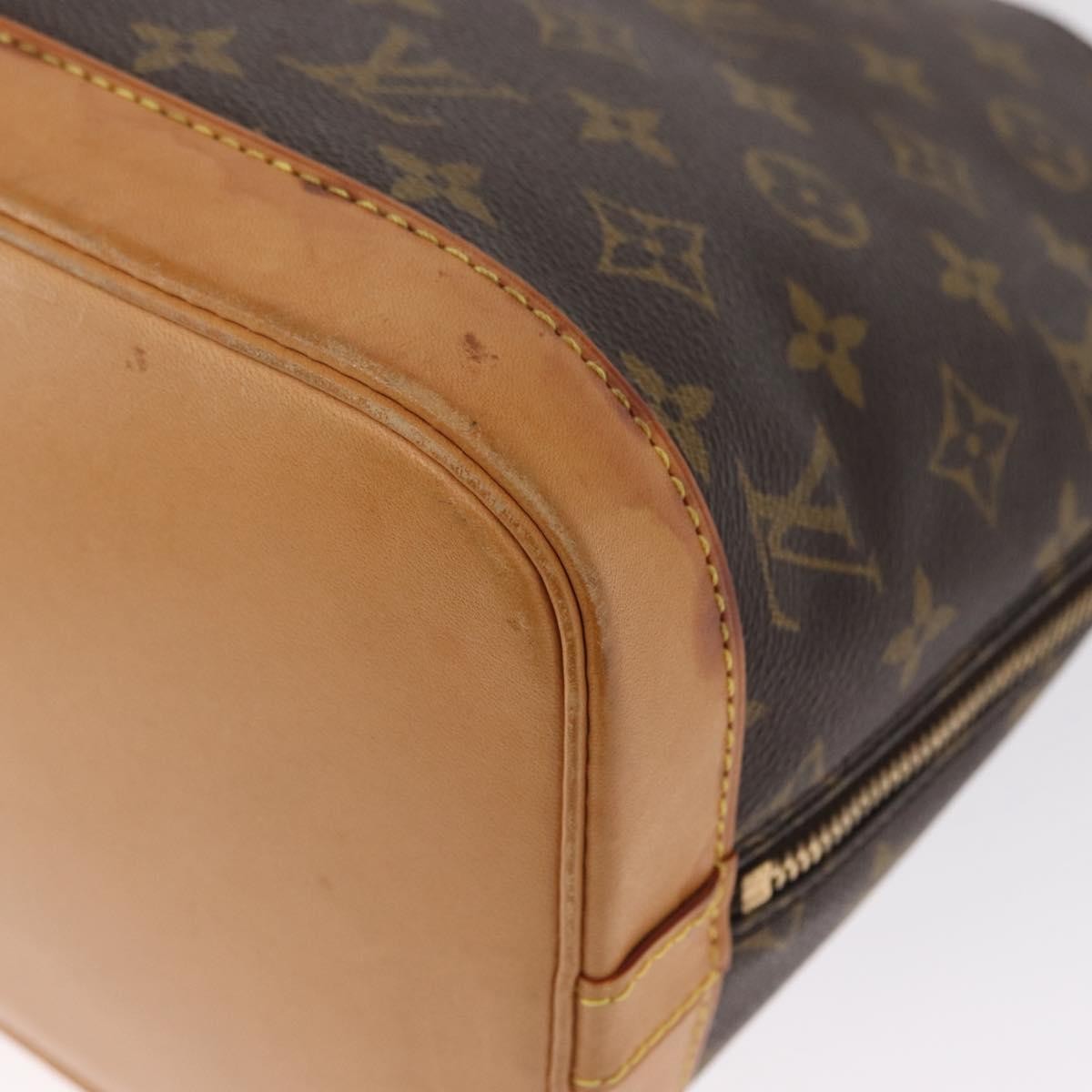 Louis Vuitton Alma Handbag Monogram Canvas Brown Canvas Handbag