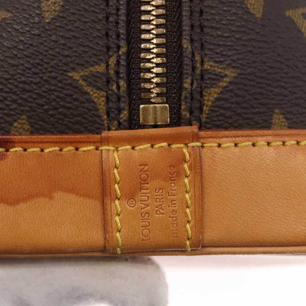 Louis Vuitton Alma Handbag Monogram Canvas Brown Canvas Handbag