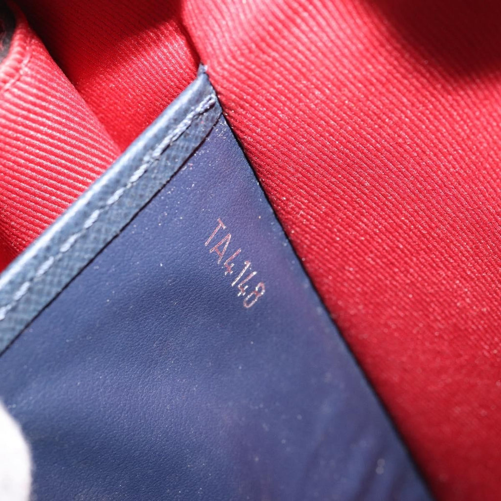 Louis Vuitton Pochette Voyage Taiga Leather Red Leather Clutche & Pouche Bag