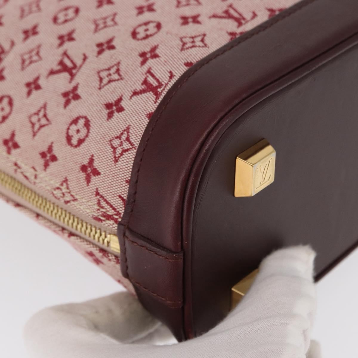 Louis Vuitton Alma Handbag Mini Lin Monogram Red Canvas Handbag