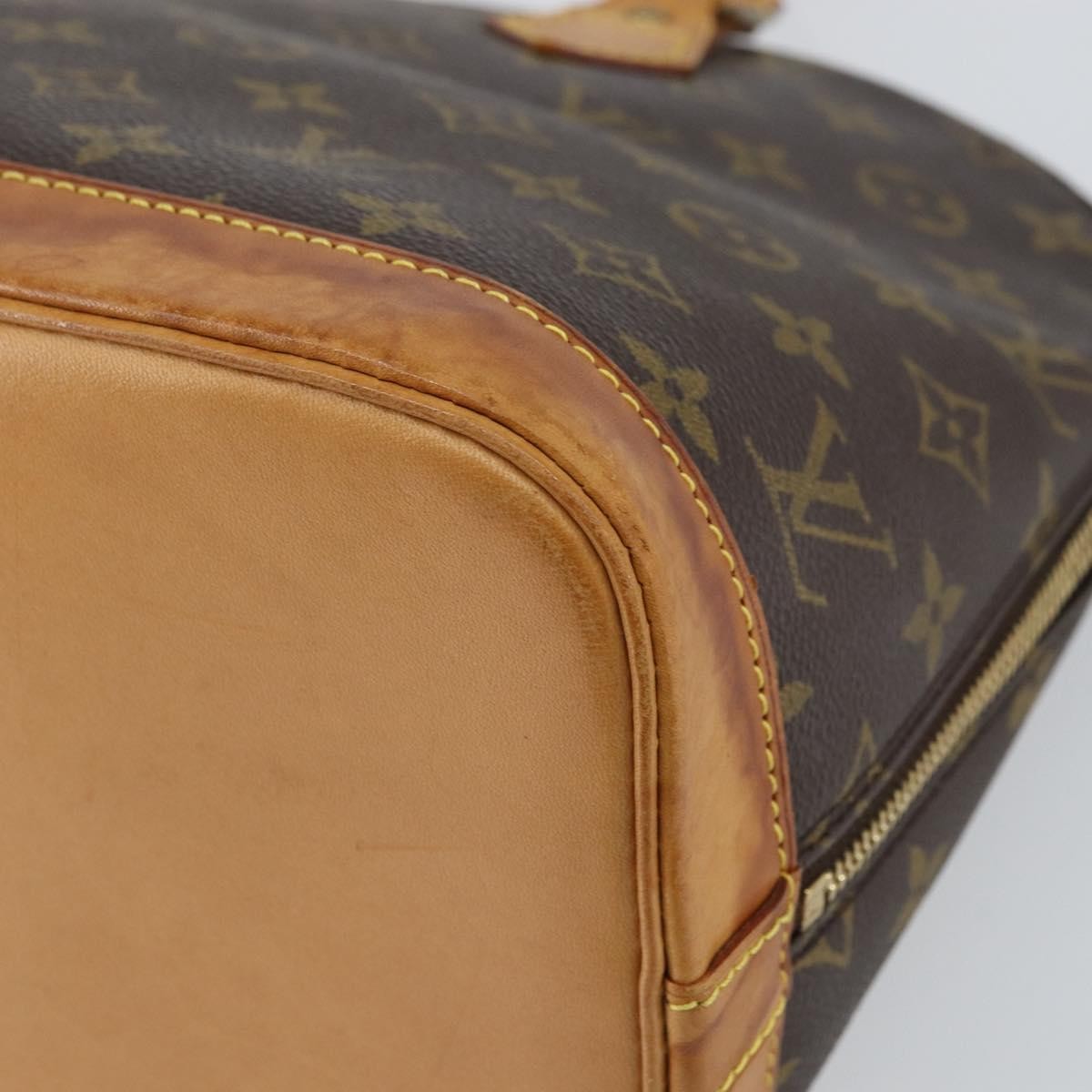 Louis Vuitton Alma Handbag Monogram Canvas Brown Canvas Handbag