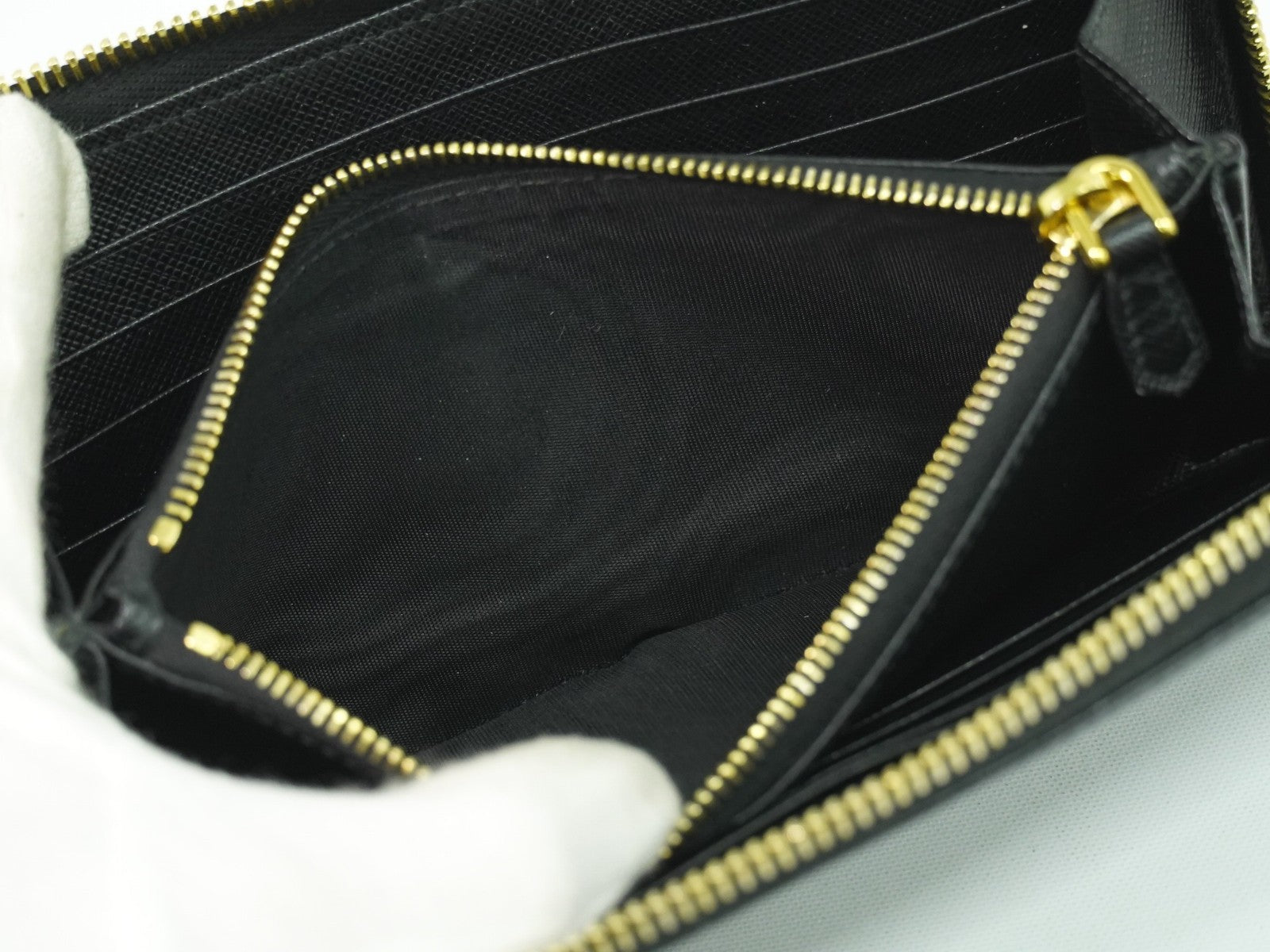 Prada Zip Around Tab Wallet Saffiano Leather Black Leather Wallets Accessory