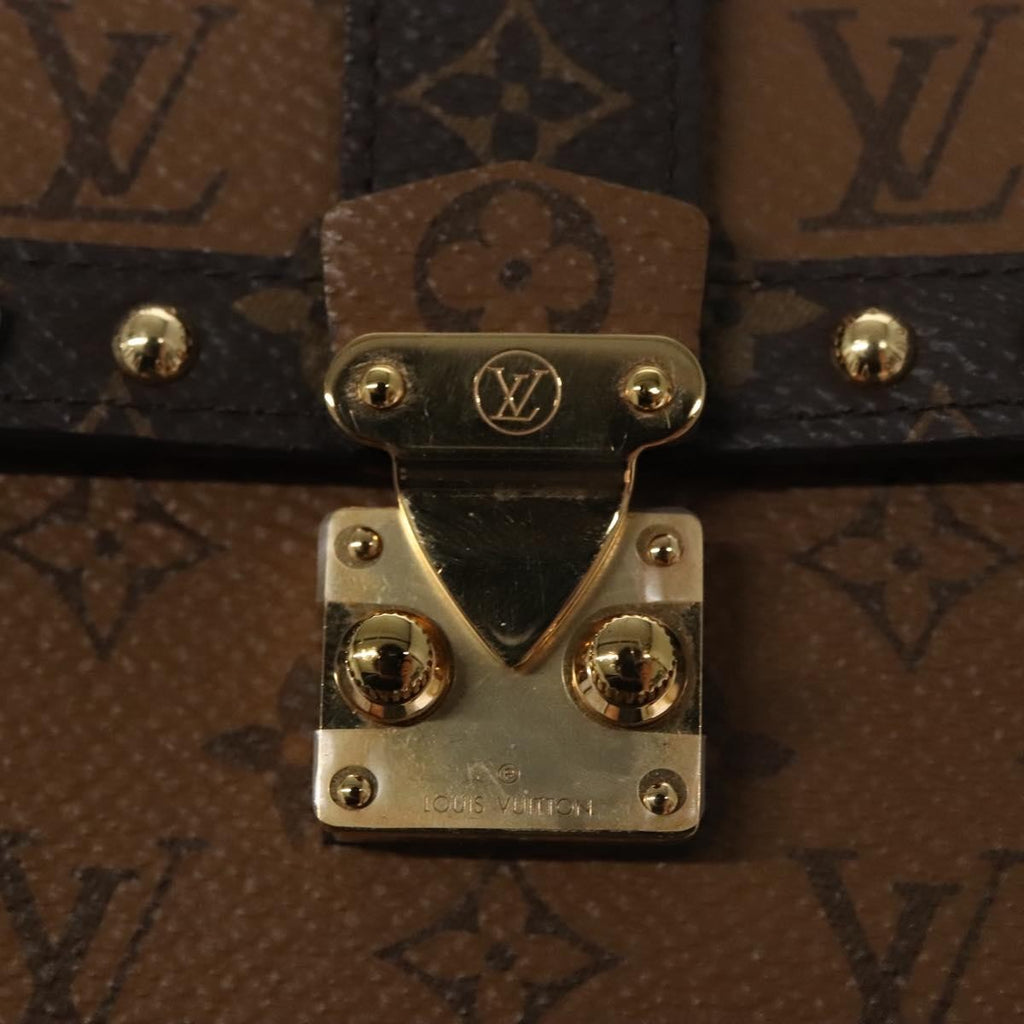 Louis Vuitton Vertical Trunk Pochette Reverse Monogram Canvas Brown Canvas Clutche & Pouche Bag