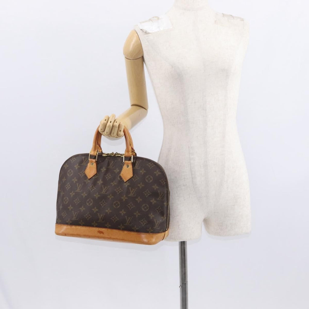 Louis Vuitton Alma Handbag Monogram Canvas Brown Canvas Handbag