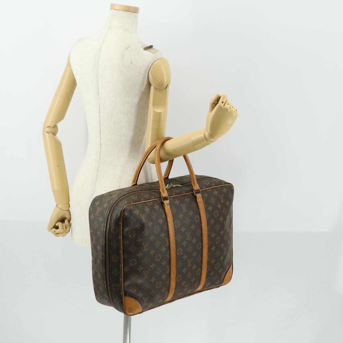 Louis Vuitton Sirius Handbag Monogram Canvas Brown Canvas Travel Bag
