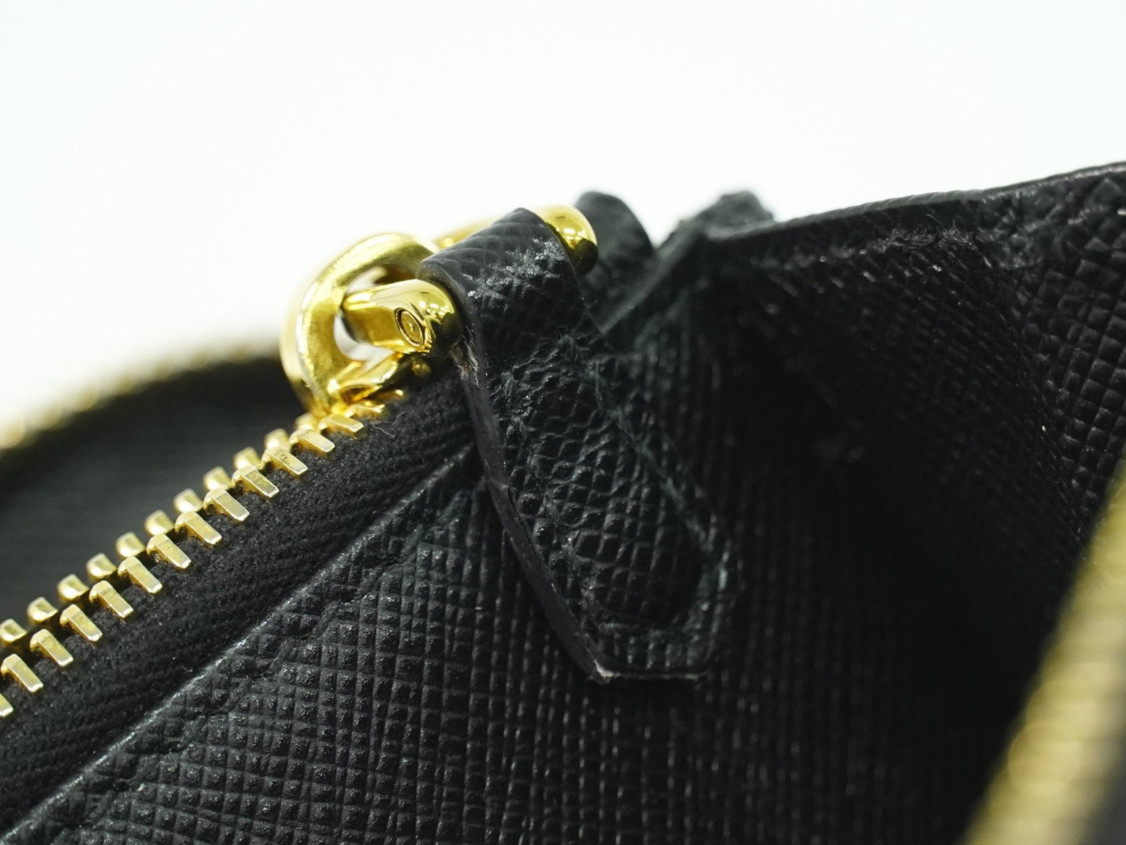 Prada Zip Around Tab Wallet Saffiano Leather Black Leather Wallets Accessory