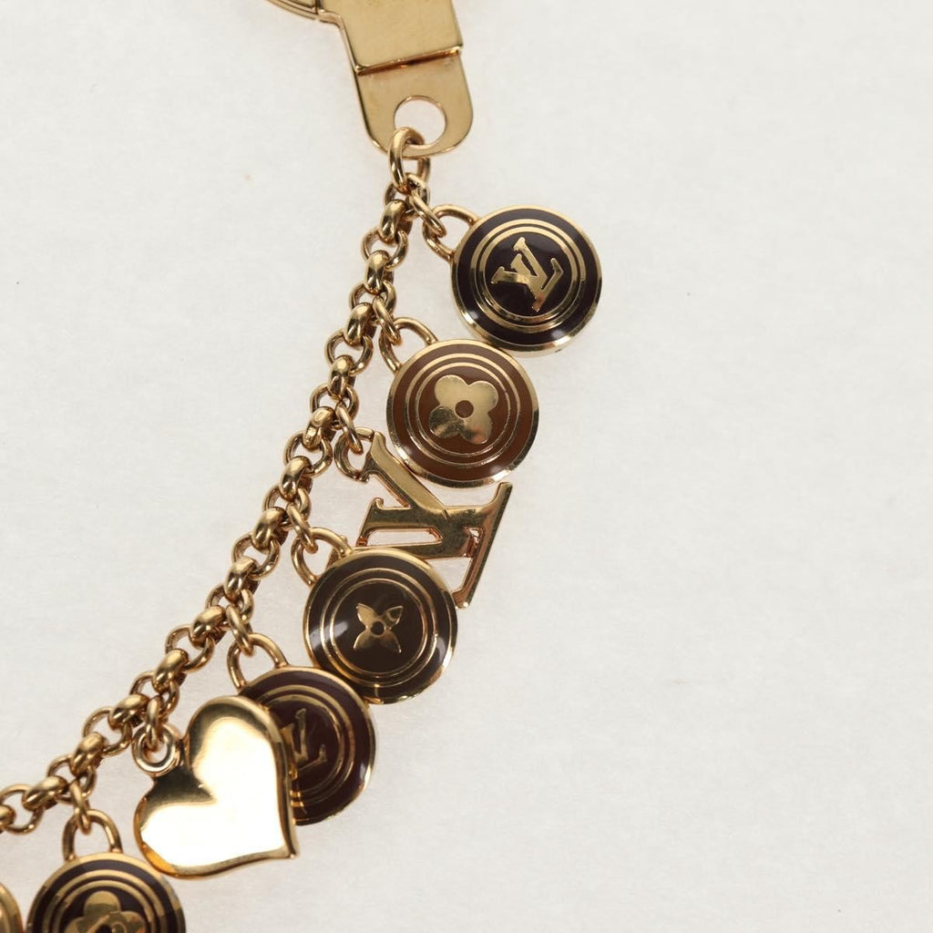 Louis Vuitton Pastilles Bag Charm And Key Holder Metal And Enamel Gold Metal Charms And Keychains Accessory