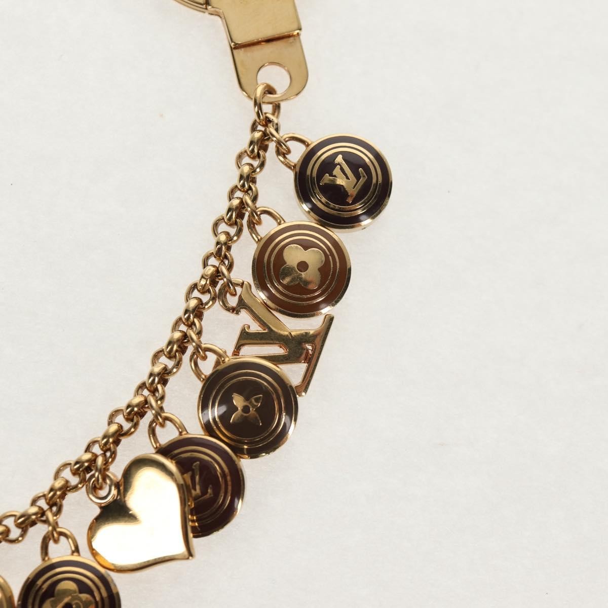 Louis Vuitton Pastilles Bag Charm And Key Holder Metal And Enamel Gold Metal Charms And Keychains Accessory