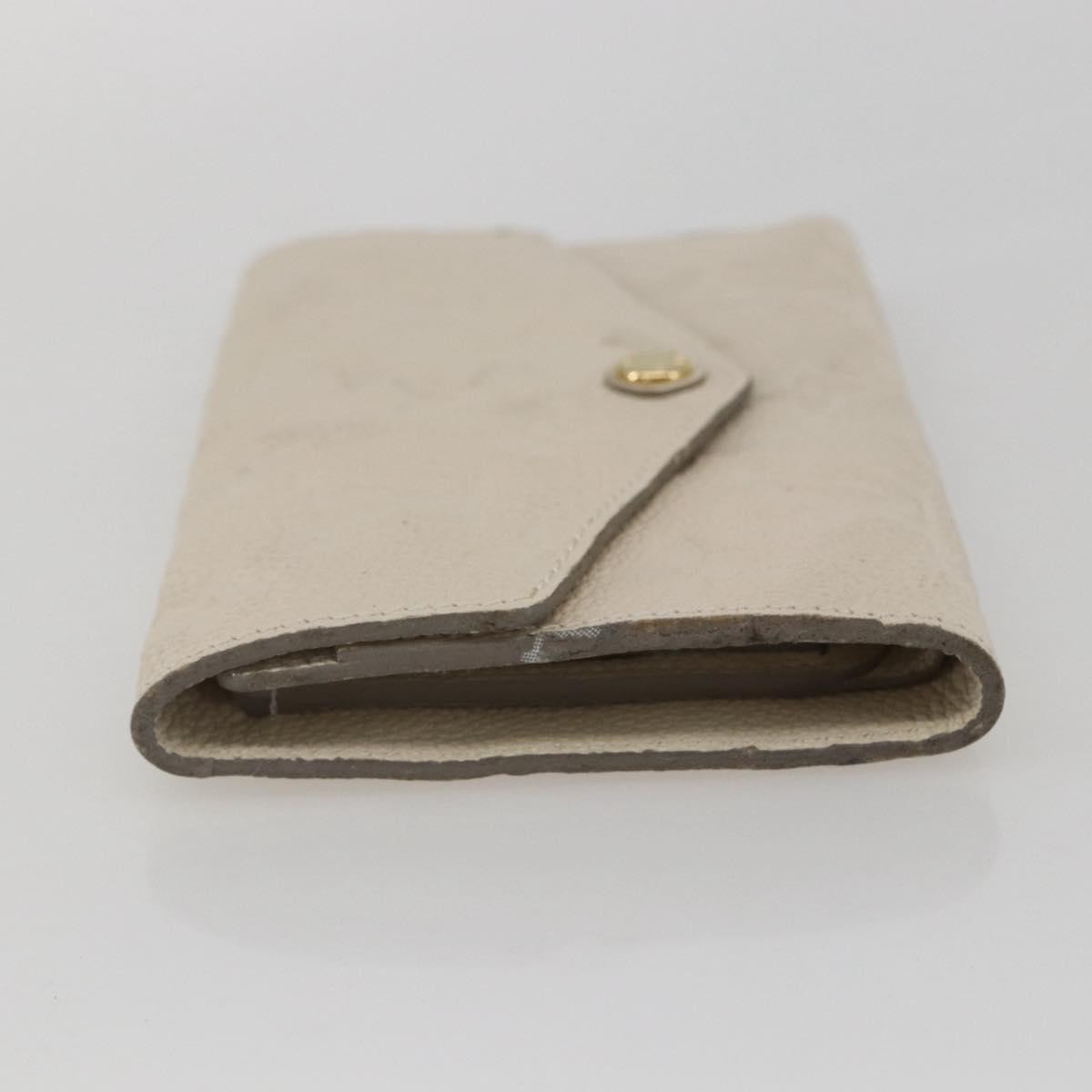 Louis Vuitton Zoe Wallet Monogram Empreinte Leather Beige Leather Wallets Accessory