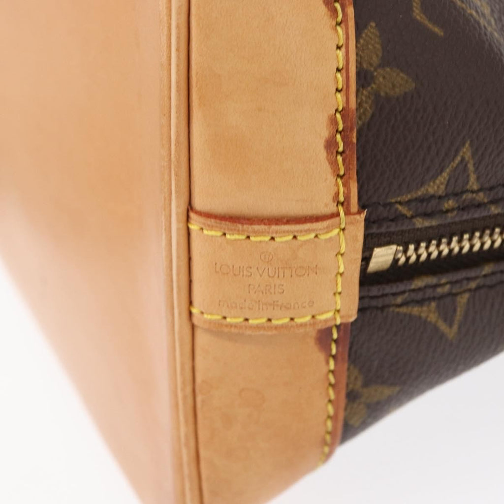 Louis Vuitton Alma Handbag Monogram Canvas Brown Canvas Handbag