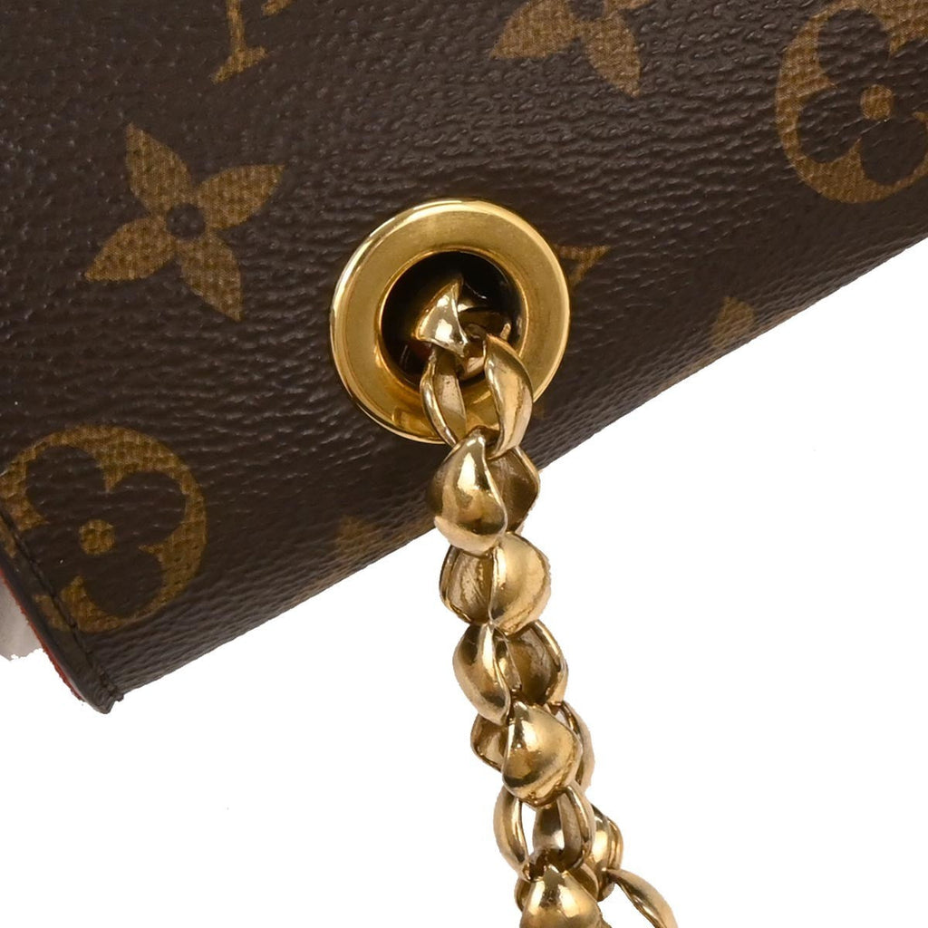 Louis Vuitton Victoire Handbag Monogram Canvas And Leather Brown Canvas Shoulder Bag