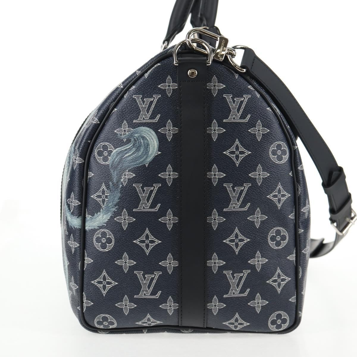 Louis Vuitton Keepall Bandouliere Bag Limited Edition Chapman Savane Monogram Canvas Navy Canvas Travel Bag