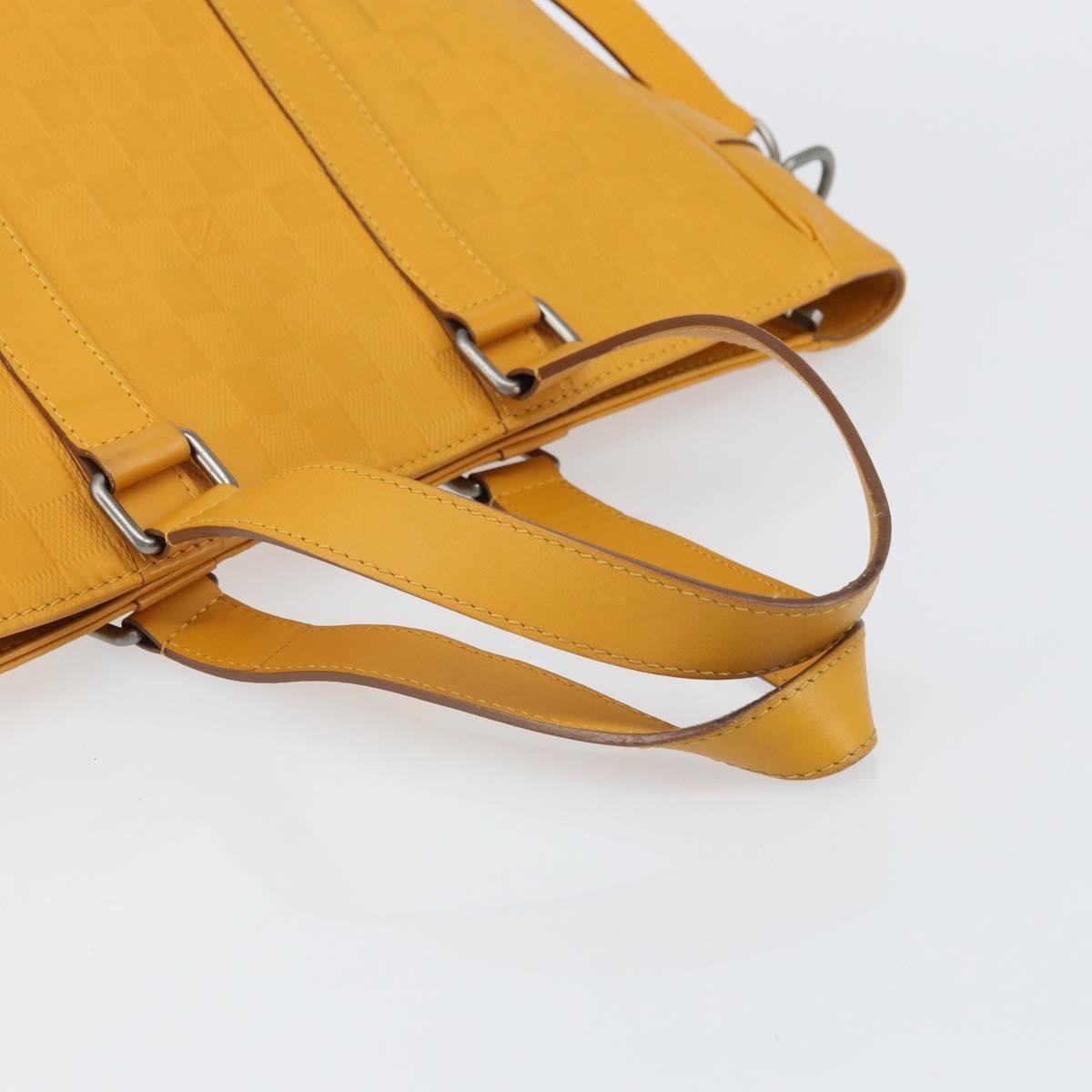 Louis Vuitton Tadao Handbag Damier Infini Leather Yellow Leather Handbag