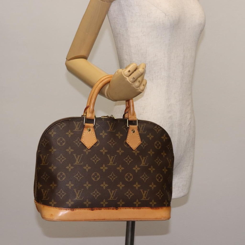 Louis Vuitton Alma Handbag Monogram Canvas Brown Canvas Handbag
