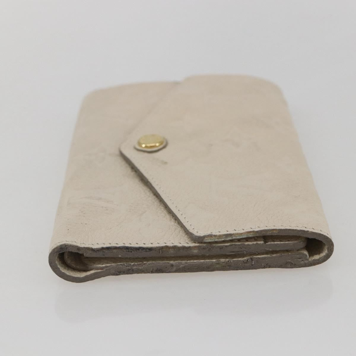 Louis Vuitton Zoe Wallet Monogram Empreinte Leather Beige Leather Wallets Accessory