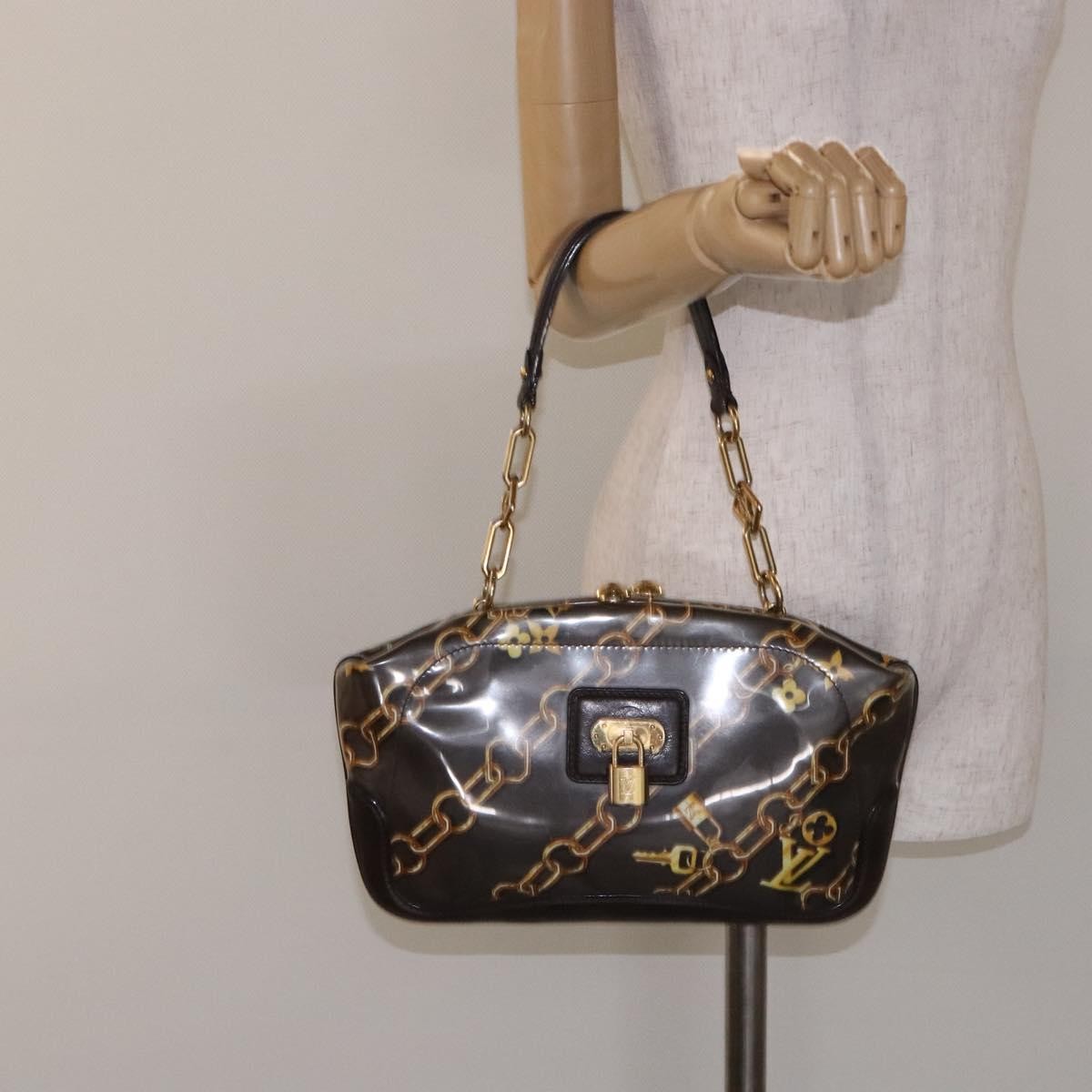 Louis Vuitton Charms Pochette Pvc Over Printed Silk Brown Canvas Clutche & Pouche Bag