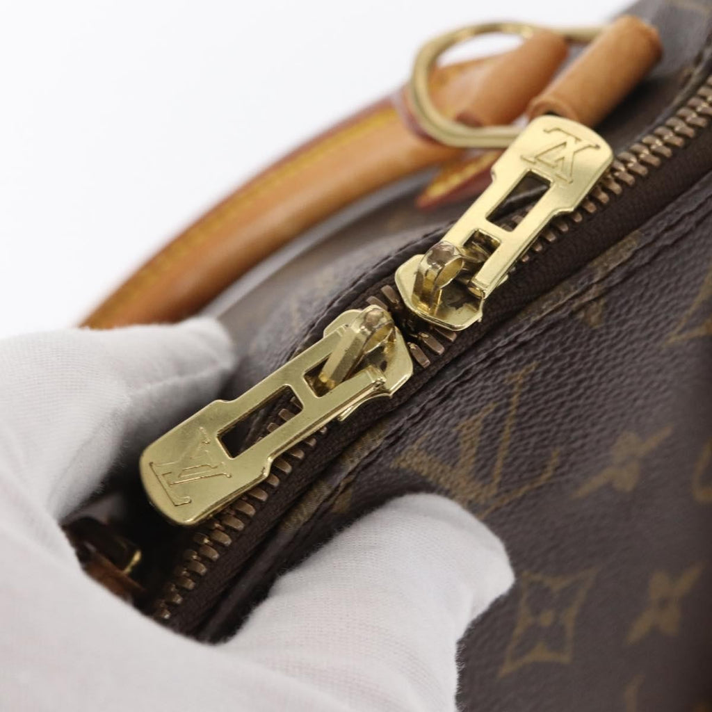 Louis Vuitton Alma Handbag Monogram Canvas Brown Canvas Handbag