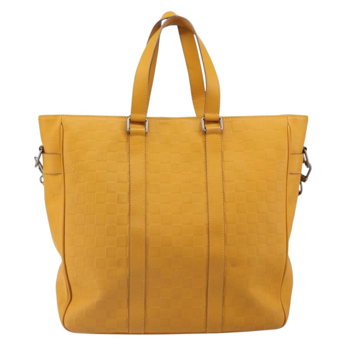 Louis Vuitton Tadao Handbag Damier Infini Leather Yellow Leather Handbag